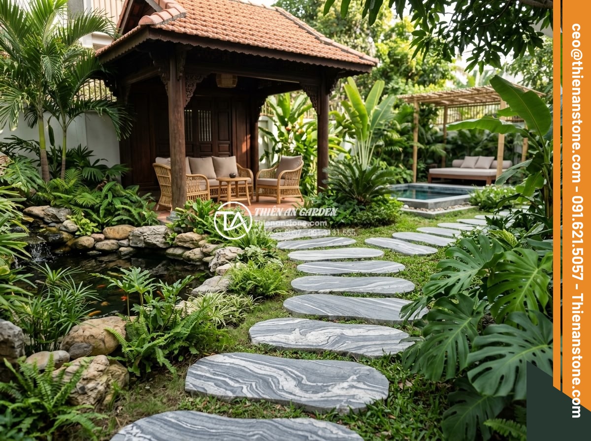 Sự khác biệt giữa đá bước dạo cắt quy cách và đá tự nhiên tự do - Elegant resort-style backyard featuring stepping stones connecting different out