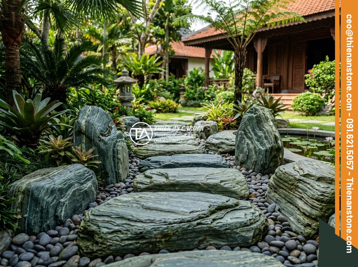 Tại sao đá dặm bước tự nhiên lại đắt hơn đá nhân tạo đúc sẵn? - Artistic arrangement of natural stepping stones creating visual harmony in a lux