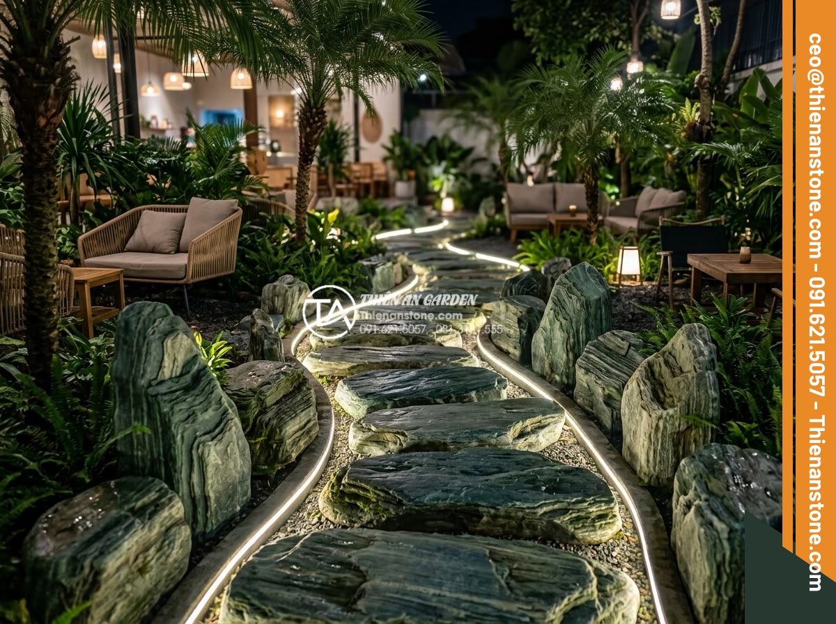Ứng dụng đá bước dạo trong thiết kế quán cafe sân vườn cực chill - Creative curved stepping stone path in a modern garden cafe with integrated LED 