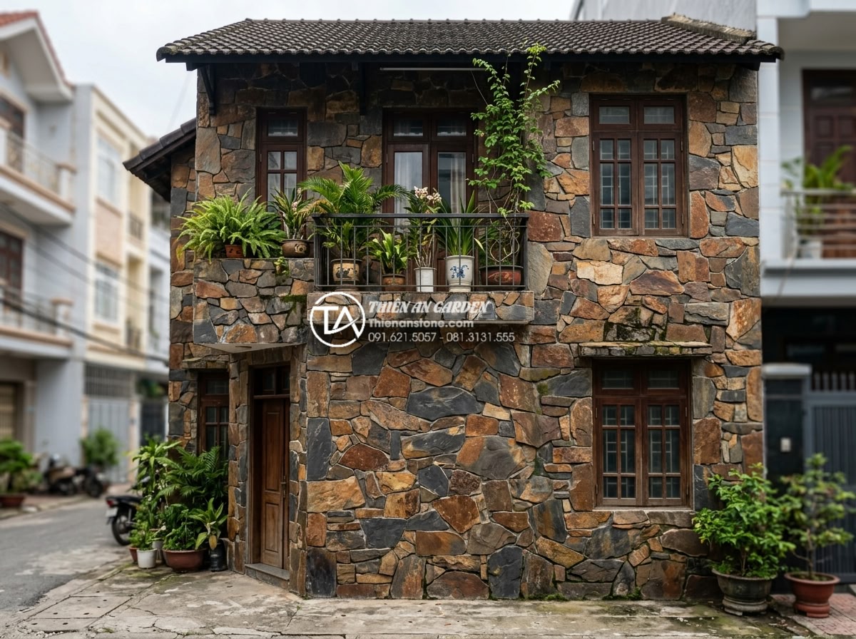 20 Ý tưởng sử dụng đá rối trang trí mặt tiền nhà phố cực ấn tượng - Long-term well-maintained decorative rubble stone townhouse facade demonstrating
