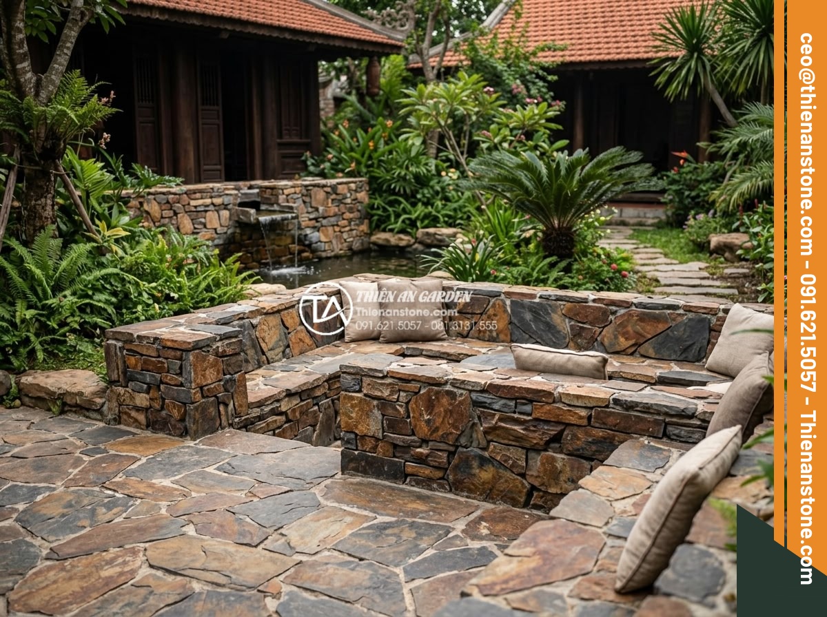 Cách chọn màu đá rối hợp mệnh gia chủ trong kiến trúc - Natural rubble stones used in luxury backyard landscape design featuring seating