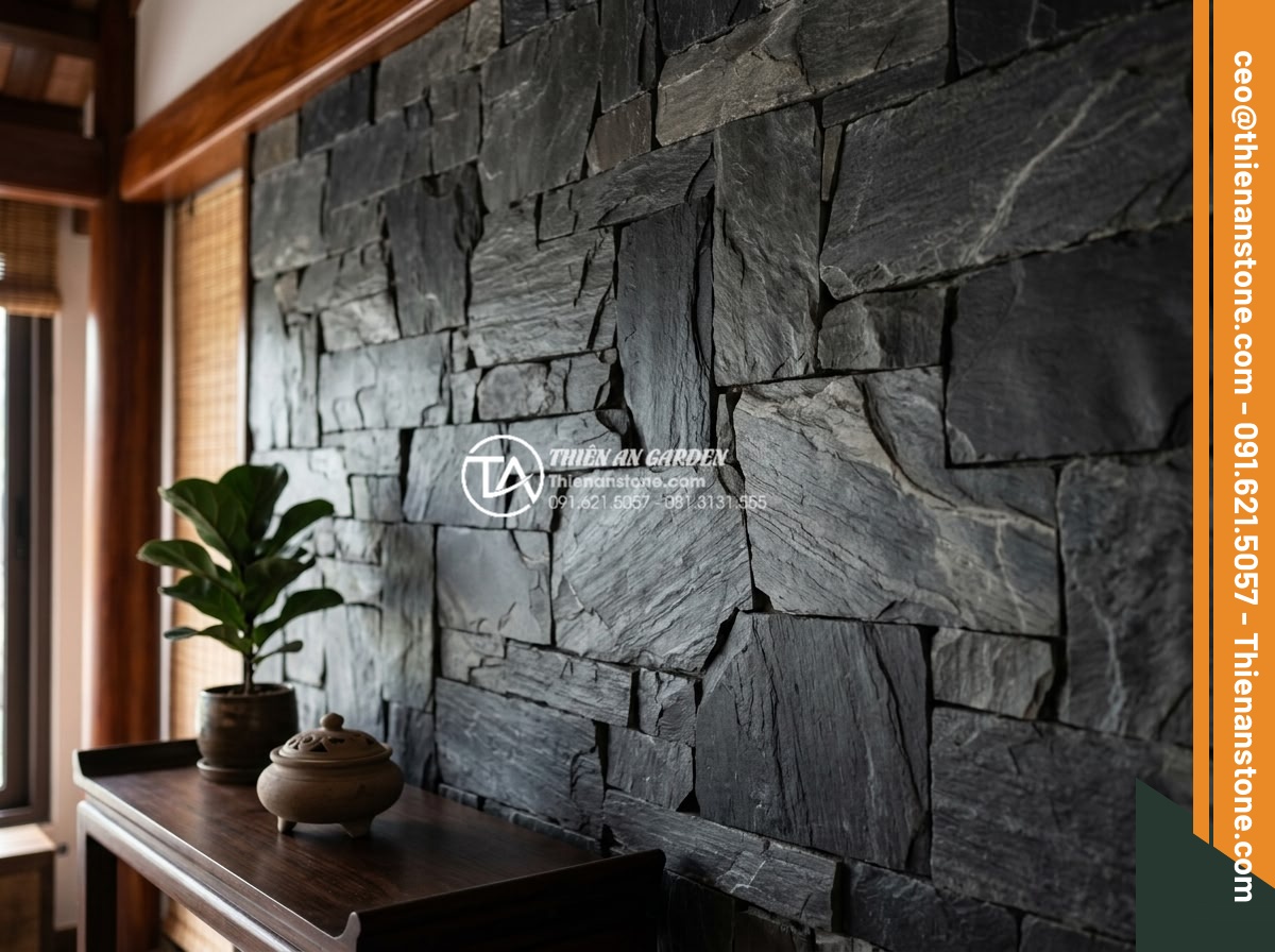 Cách chọn màu đá rối hợp mệnh gia chủ trong kiến trúc - Detailed close-up of multi-colored rubble stone wall in interior Feng Shui desig