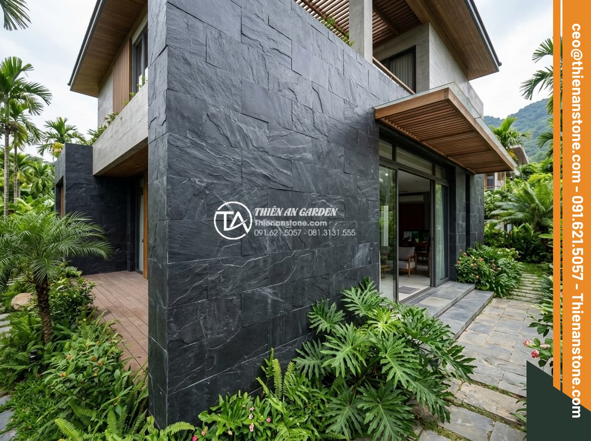 Cách chọn màu đá rối hợp mệnh gia chủ trong kiến trúc - Panoramic shot of multi-colored rubble stones integrated into modern villa exter