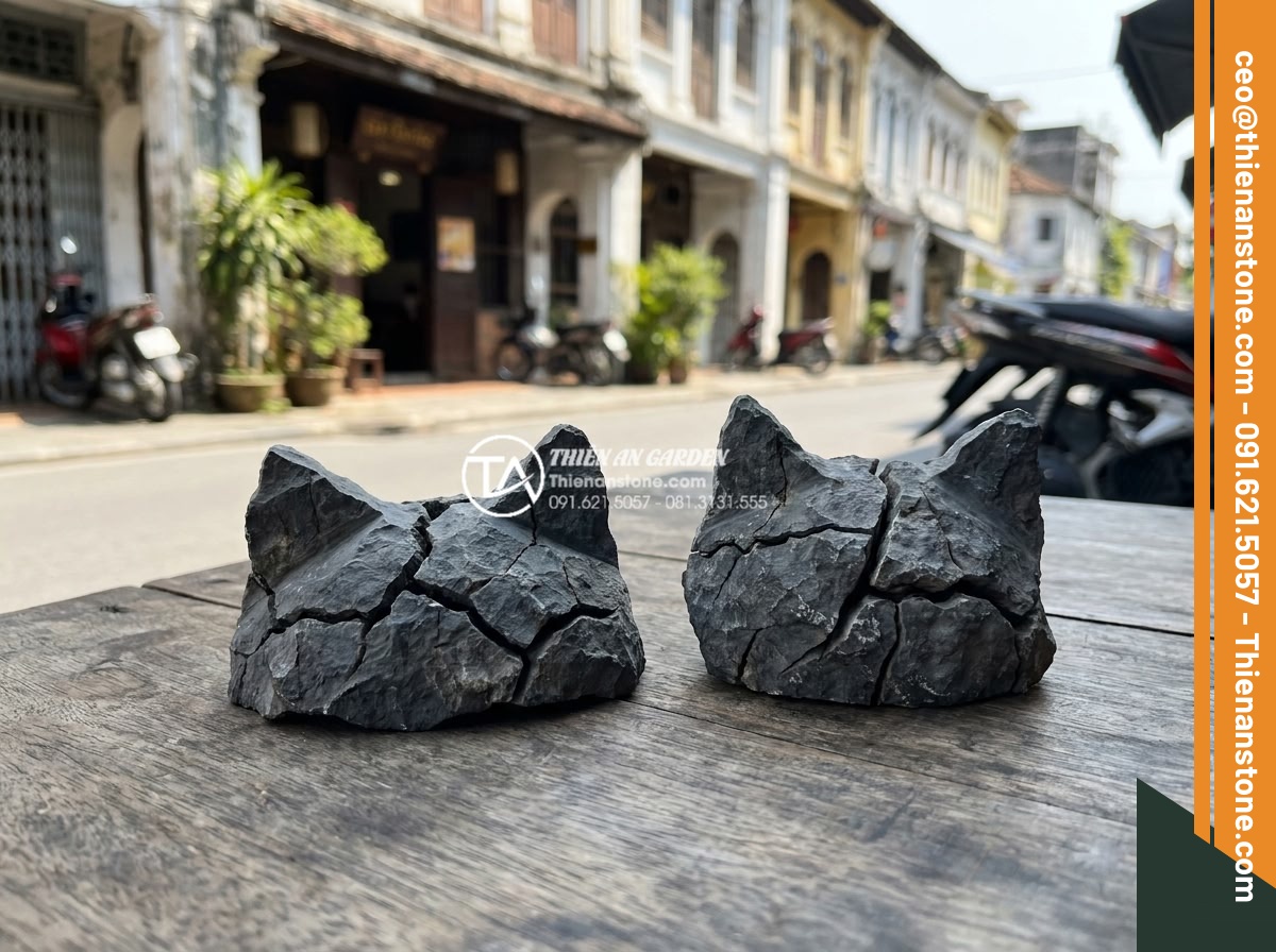 Cách vận chuyển đá tai mèo khối lượng lớn không bị nứt vỡ - Damaged cat ear stones showing cracks caused by improper handling and vibration 