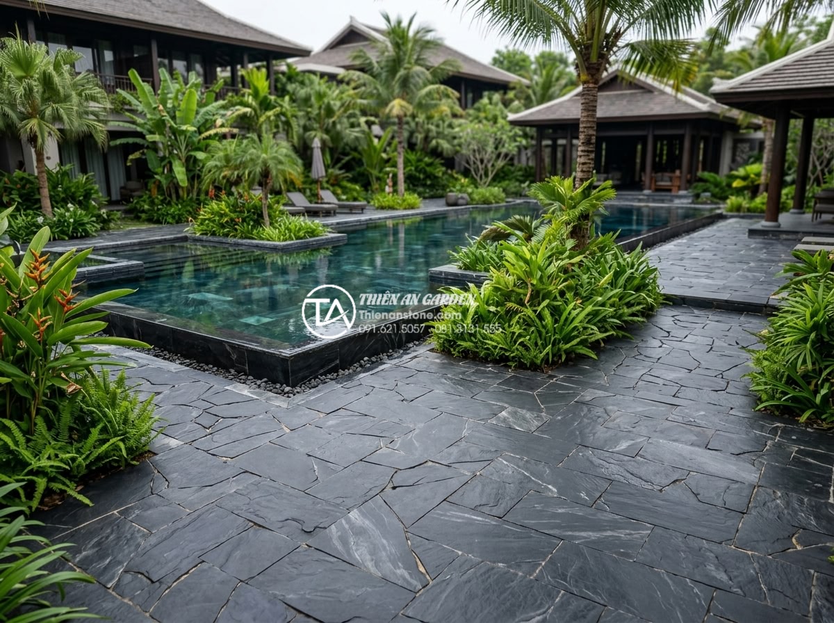 Đá rối lát sân vườn: Giải pháp thi công bền vững và thẩm mỹ - Luxury resort exterior with extensive stone chaotic paving, pools and tropical l