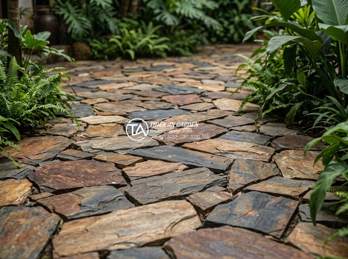 Đá rối lát sân vườn: Giải pháp thi công bền vững và thẩm mỹ - Variety of natural stone tiles in chaotic patterns showing color diversity from 
