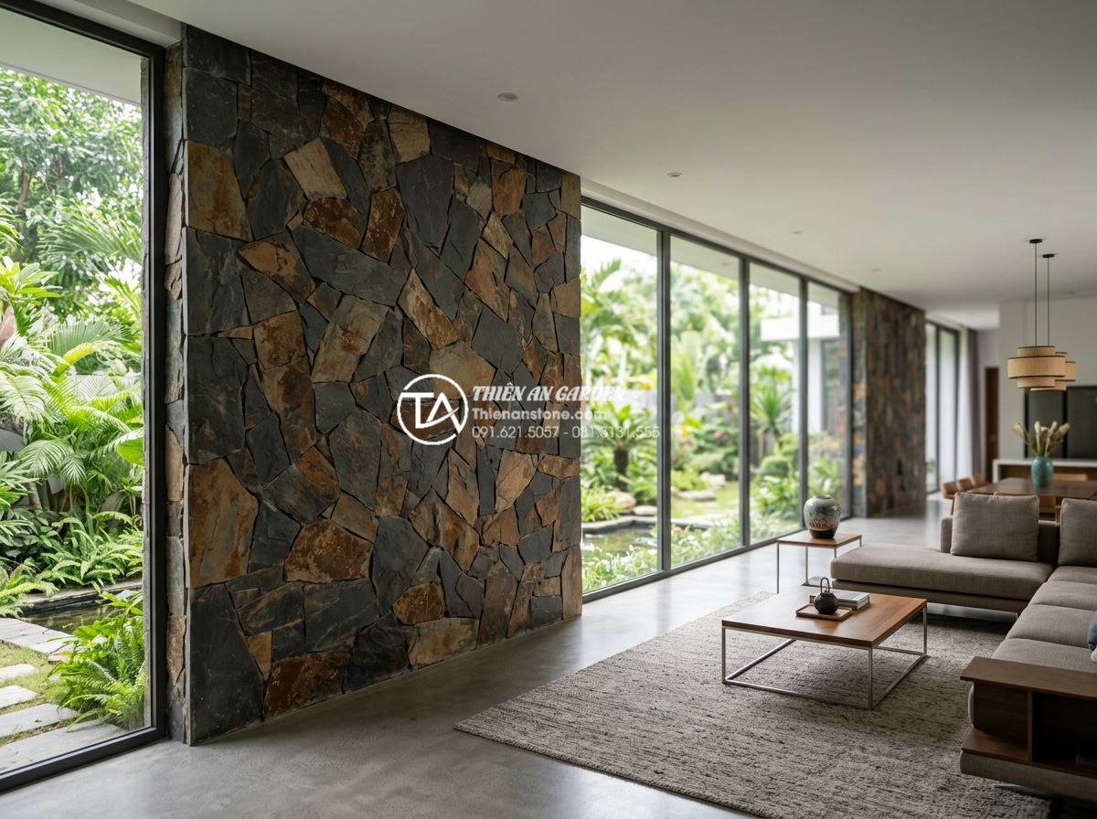 Đá rối ốp tường: Nghệ thuật tạo điểm nhấn cho không gian sống - Wide panoramic shot of a luxurious modern villa interior featuring a full-height
