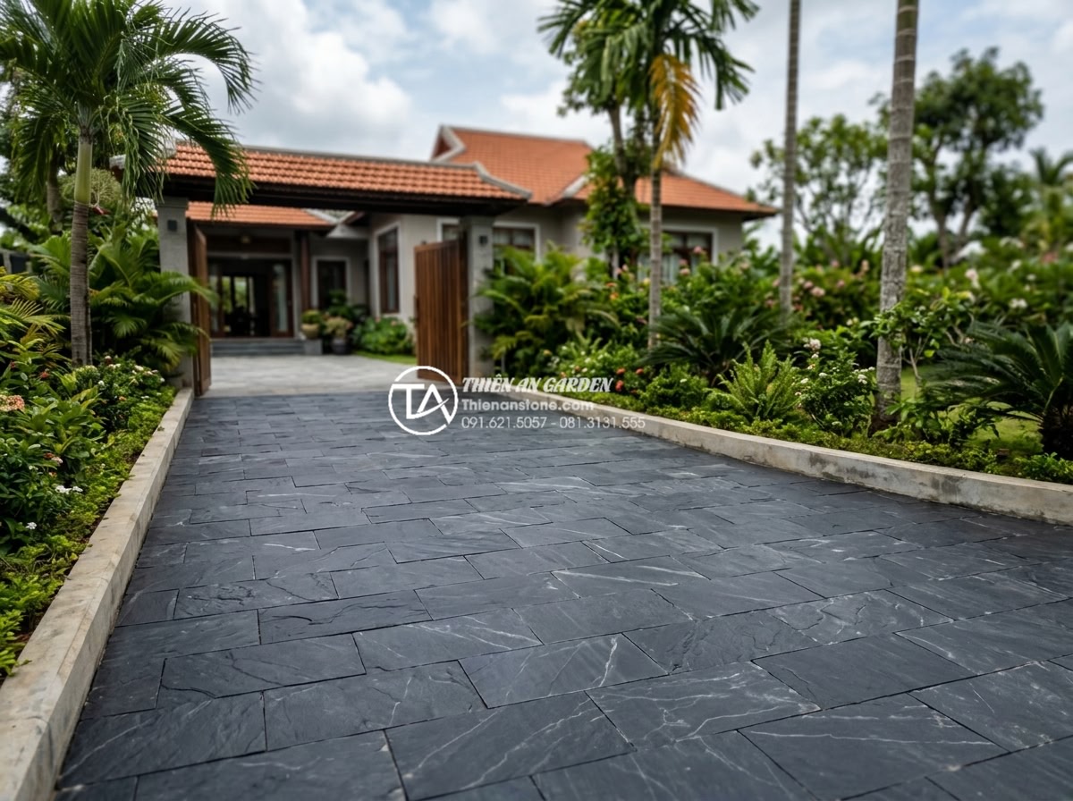 Review độ bền đá rối đen Lai Châu khi lát đường đi ô tô - Completed professional installation of durable stone driveway ready for vehicle 