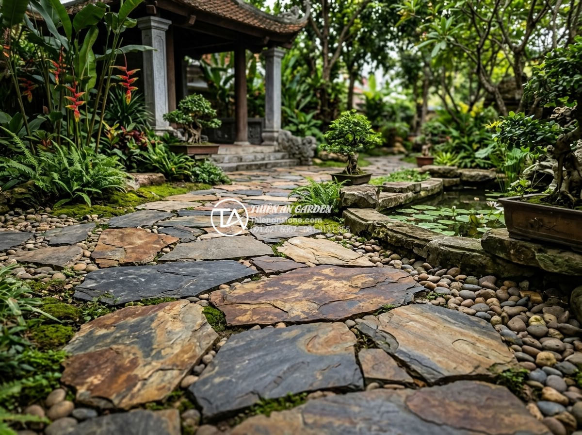 So sánh đá rối đen và đá rối đa sắc Lai Châu: Nên chọn loại nào? - Artistic garden scene featuring both black and multi-colored chaotic stones inte