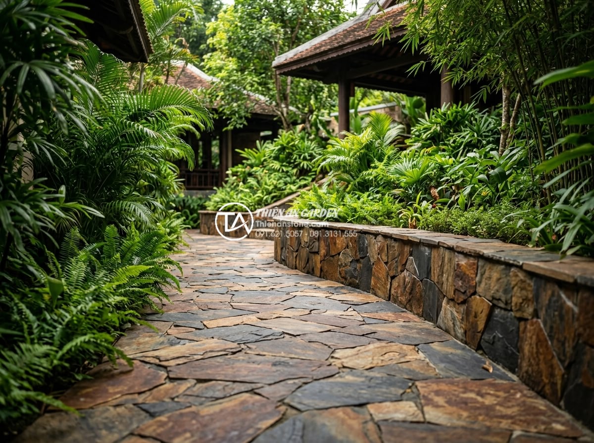 Tại sao nên dùng ốp gạch rối thay vì gạch men thông thường? - Green landscape featuring environmentally conscious da roi tu nhien wall and flo