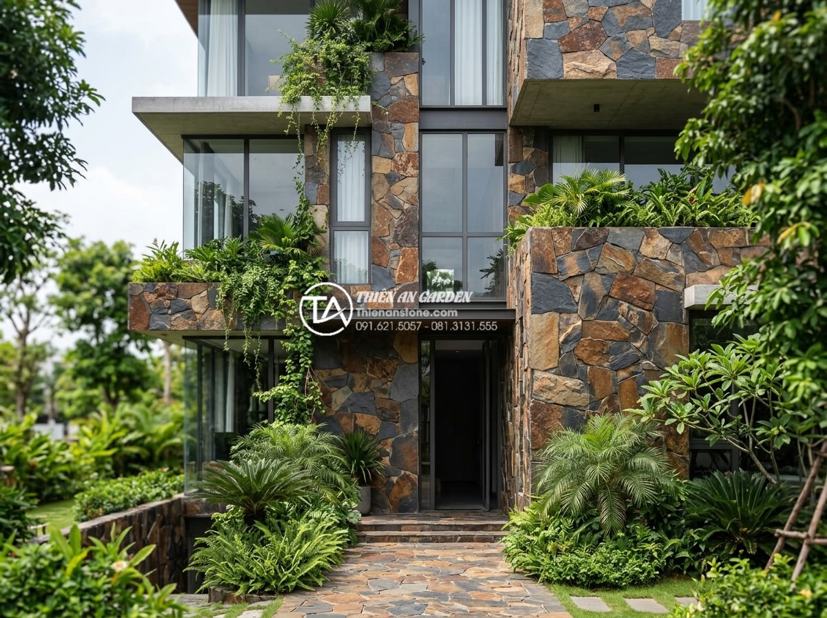 Top 10 mẫu đá rối ốp mặt tiền đẹp dẫn đầu xu hướng 2026 - Luxury residential building front view with premium irregular natural stone faca