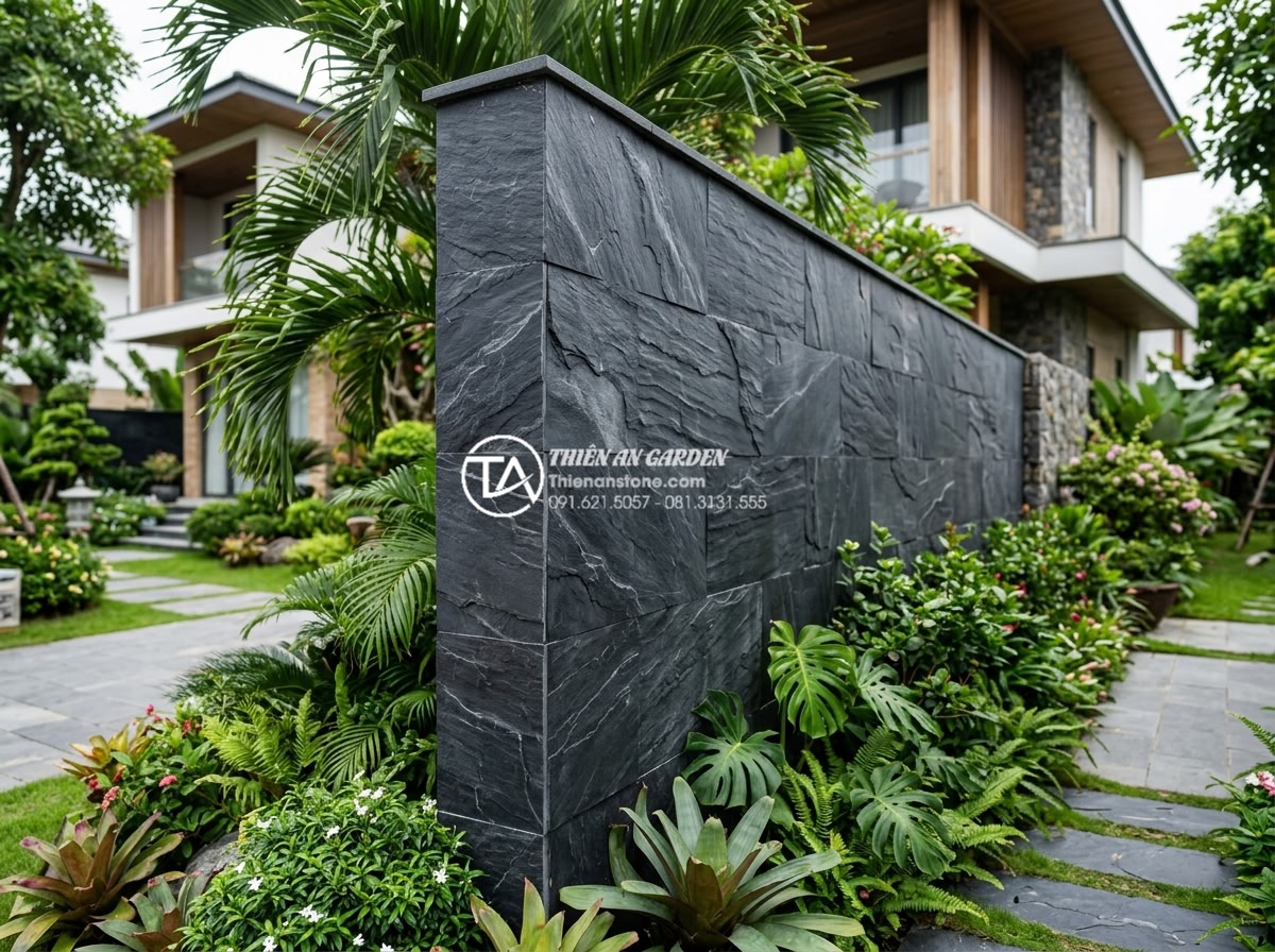 Ưu điểm của đá rối vàng ốp tường trong phong thủy nhà ở - Full view of durable golden stone clad garden wall in luxury villa landscape, wi