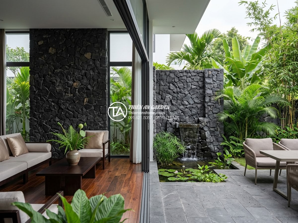 Ưu điểm của đá rối vàng ốp tường trong phong thủy nhà ở - Realistic application of golden chaotic stones on both indoor living room accent