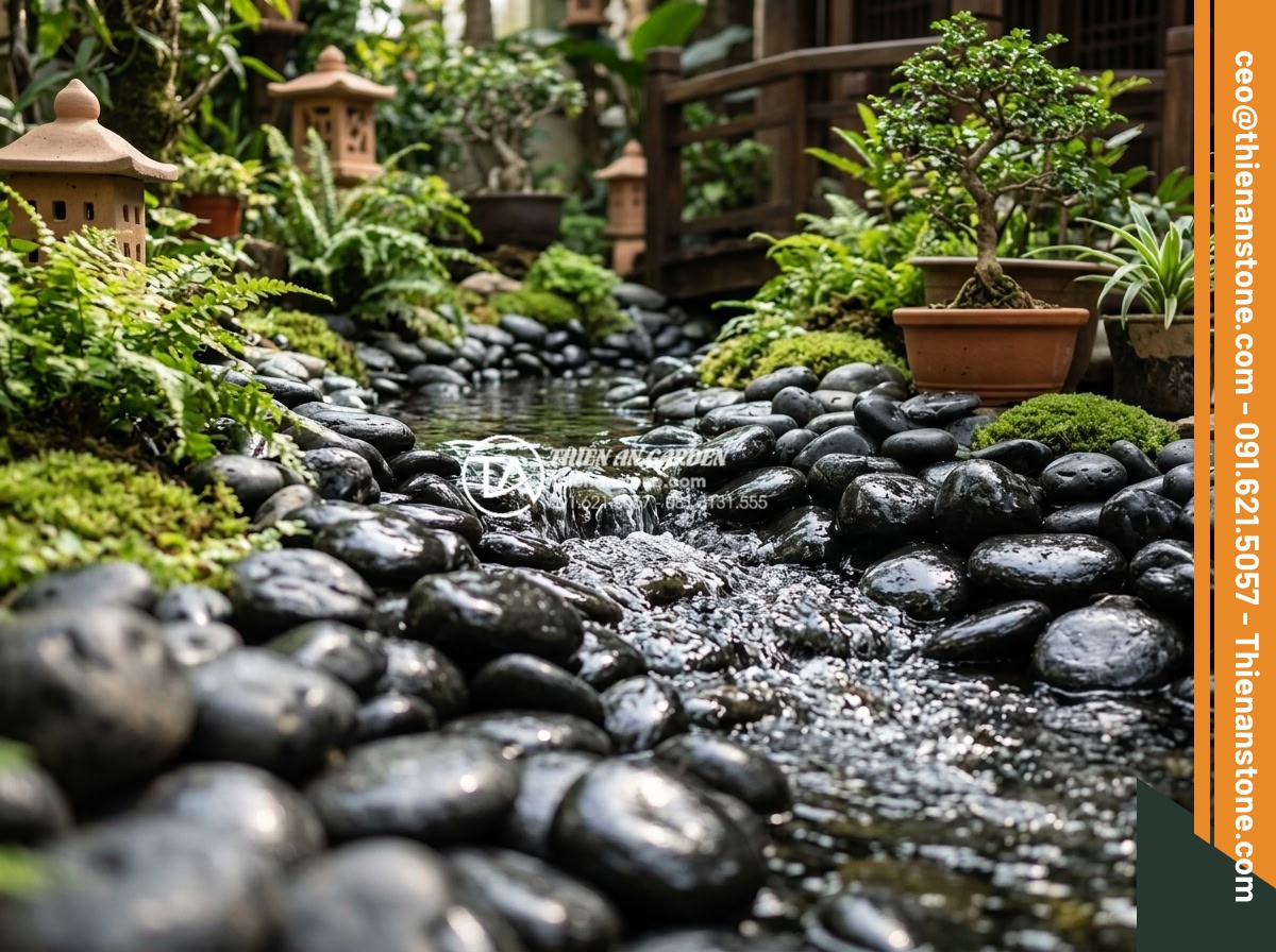 Cách xử lý đá cuội đen bị bạc màu và bí quyết giữ màu đá luôn bóng đẹp - Hình 14 Cách xử lý đá cuội đen bị bạc màu và bí quyết giữ màu đá luôn bóng đẹp - Well-maintained shiny black pebbles in pristine condition after regular upkeep i