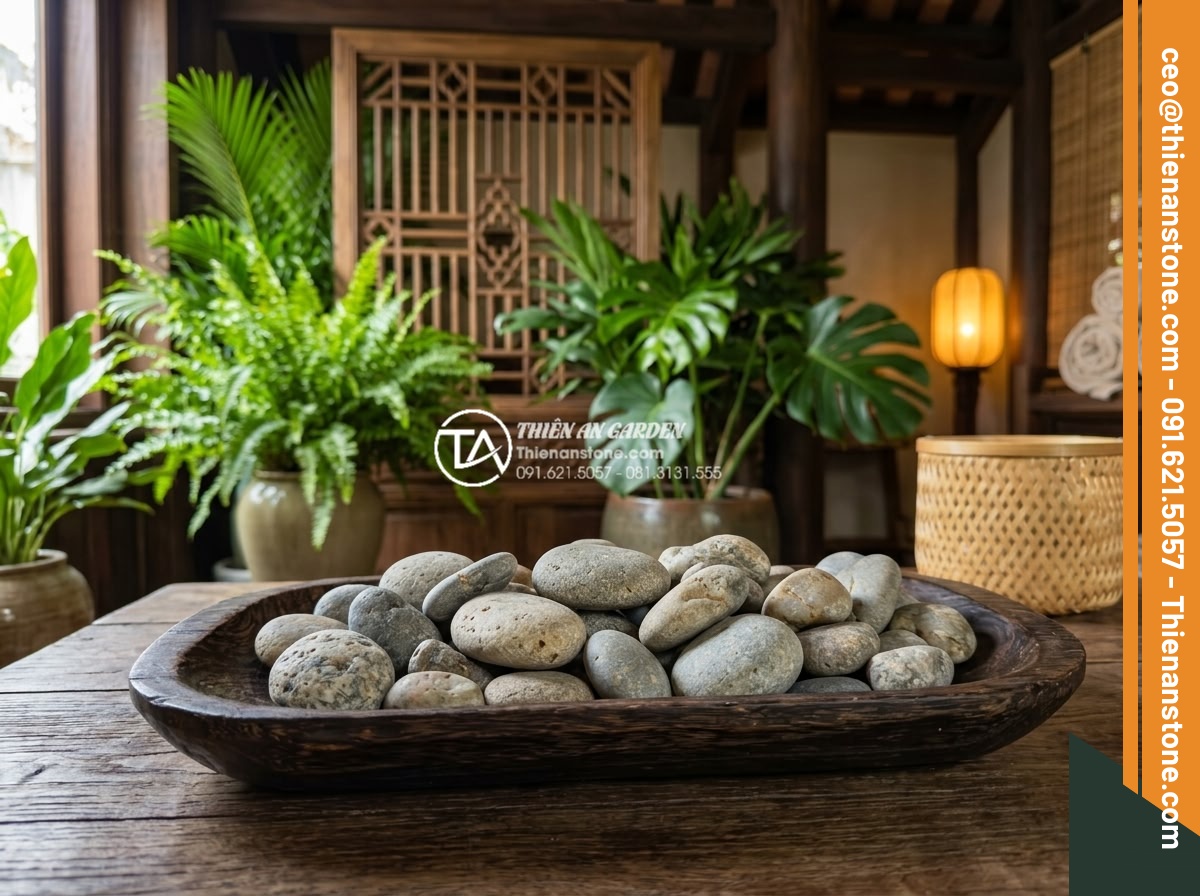 Đá cuội tròn: Ứng dụng trong massage đá nóng và trang trí spa cao cấp - Collection of various sized round river pebbles displayed in a luxurious spa int