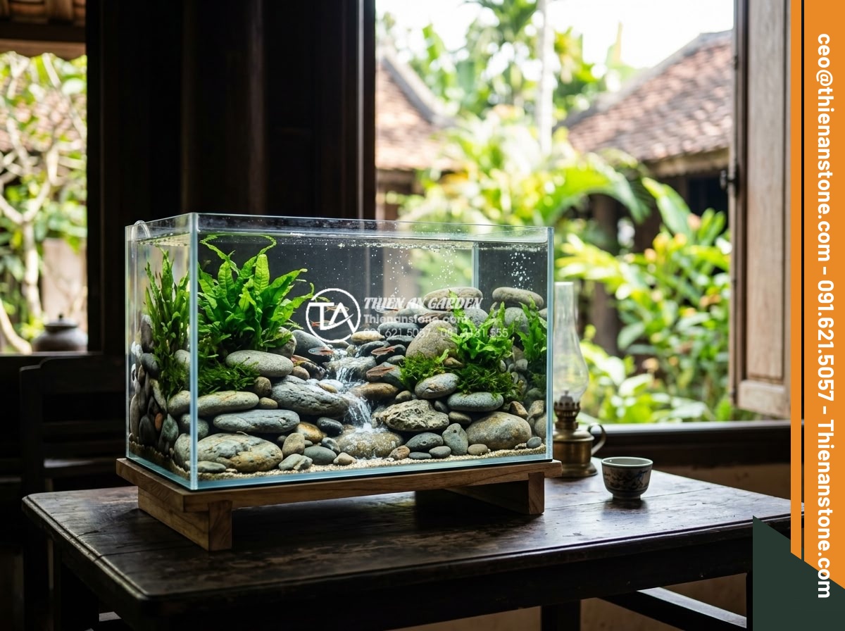 Hướng dẫn tự làm suối đá cuội mini trong bình thủy sinh cho người mới - Creative pebble stone layout examples in mini aquariums demonstrating aesthetic 