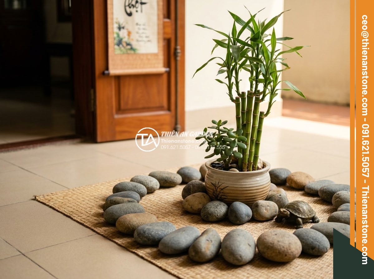 Tác dụng của đá cuội trong đời sống và ý nghĩa phong thủy bạn chưa biết - Feng shui arrangement of pebble stones in a home entrance with lucky plants and 