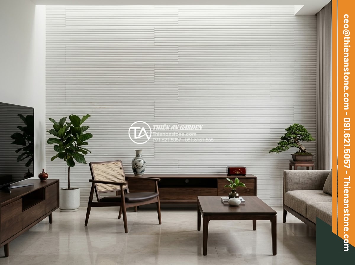 Cách tính diện tích và số lượng đá răng lược cần mua chính xác nhất - Modern interior wall cladding with gray comb tooth stone in luxury living room, 