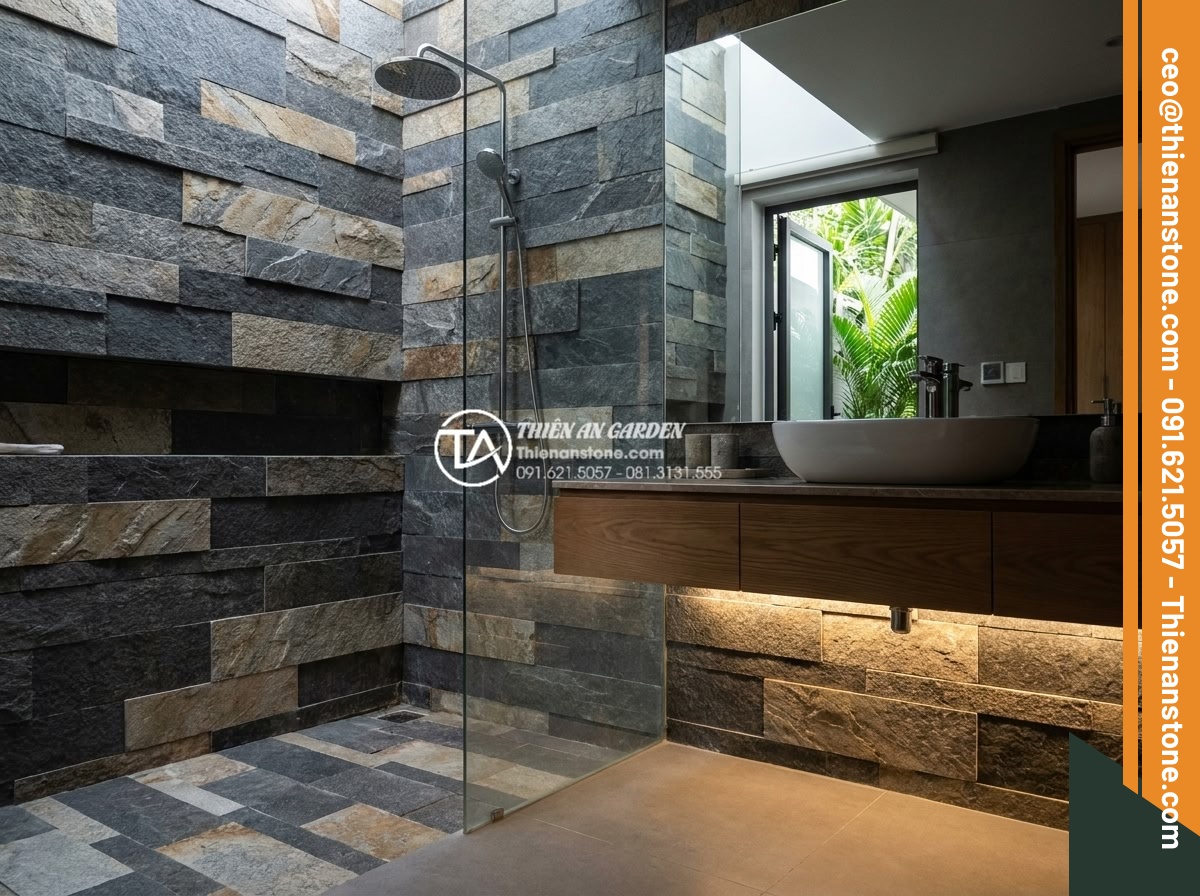 Đá ghép đen và đá ghép vân gỗ: Sự kết hợp hoàn hảo cho không gian nội thất - Modern bathroom featuring black mosaic stone flooring and wall accents with subt