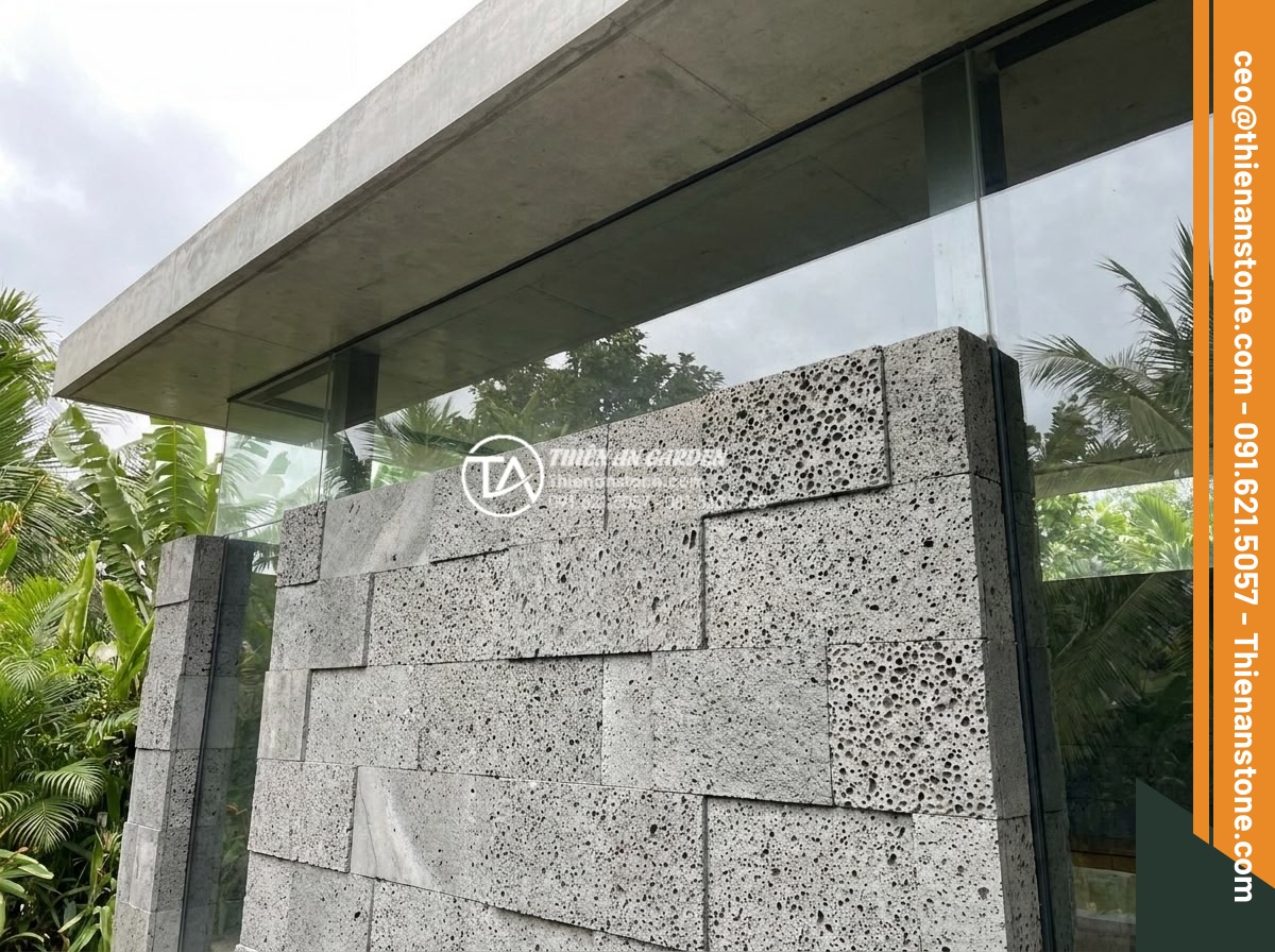 Đá ghép tổ ong xám: Xu hướng lựa chọn hàng đầu cho kiến trúc hiện đại - Artistic rendering of gray honeycomb stacked stone integrated into a futuristic 