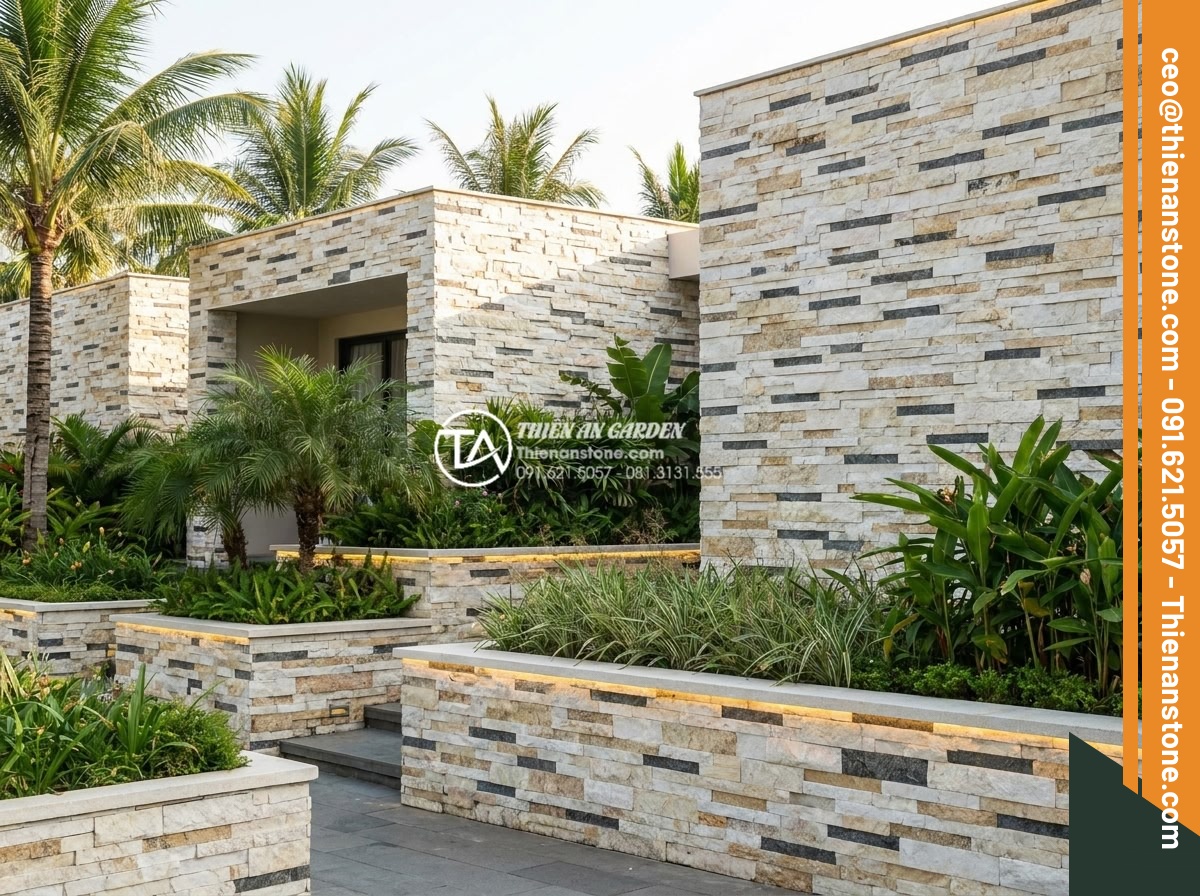 Đá ghép trang trí tường: Checklist 5 bước kiểm tra trước khi nghiệm thu - Hình 6 Đá ghép trang trí tường: Checklist 5 bước kiểm tra trước khi nghiệm thu - Modern resort exterior showcasing extensive natural stone mosaic wall applicatio