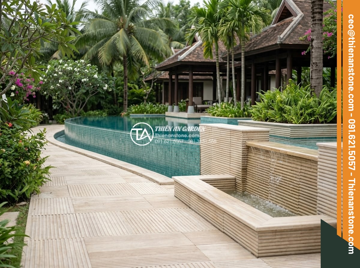Hướng dẫn kỹ thuật ốp đá răng lược chuẩn xác, bền đẹp với thời gian - Hình 22 Hướng dẫn kỹ thuật ốp đá răng lược chuẩn xác, bền đẹp với thời gian - Resort pool area with decorative tooth comb stone accents around water features