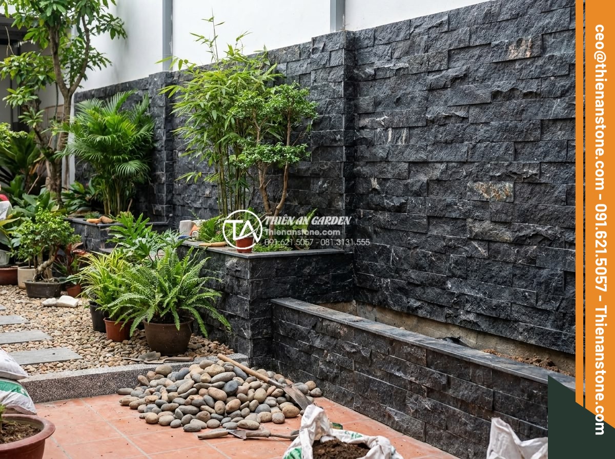 Khám phá vẻ đẹp mộc mạc của đá ong ghép 10x50 trong thiết kế Cafe sân vườn - Professional team from Thien An Stone company working on cafe garden project wit
