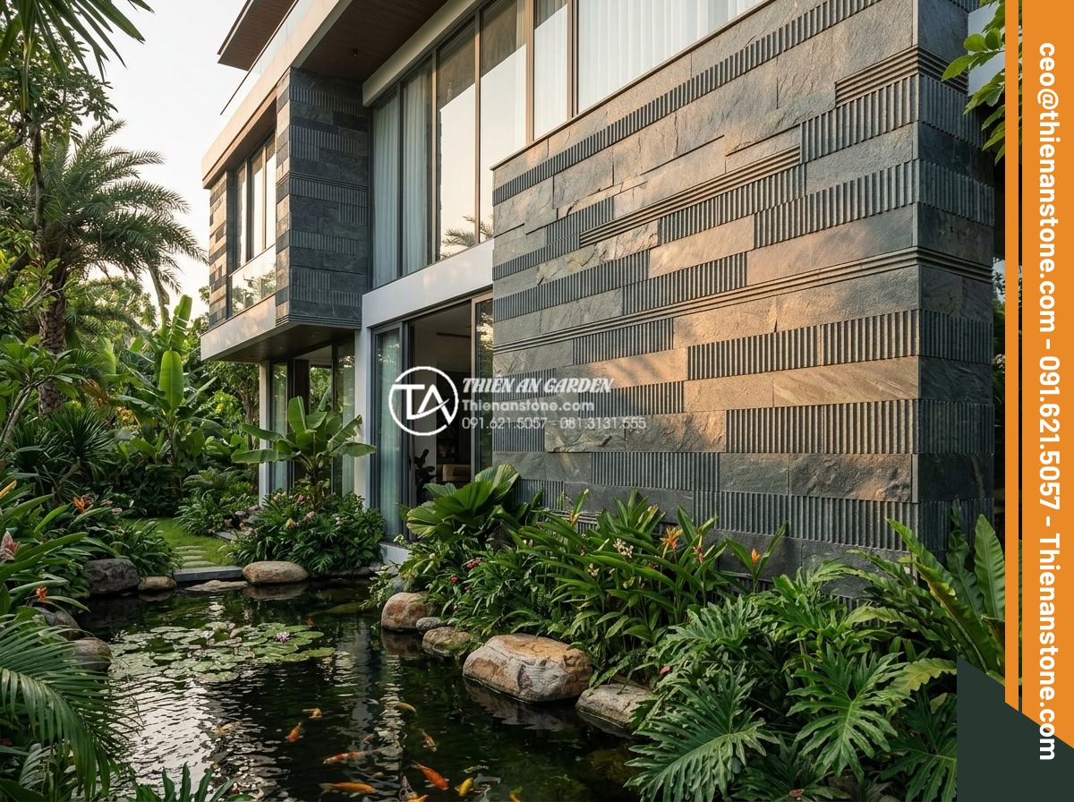 Nên dùng keo dán đá hay xi măng khi ốp đá răng lược lên tường? - Wide angle professional photograph of a modern luxury villa exterior featuring n