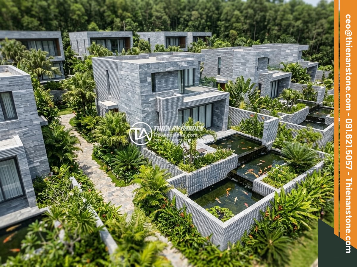Nên dùng keo dán đá hay xi măng khi ốp đá răng lược lên tường? - Aerial view of a completed high-end resort project showcasing extensive comb-too