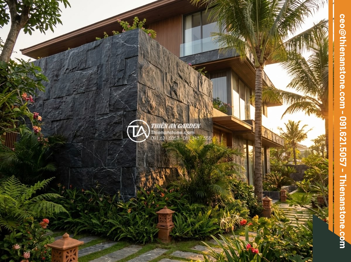 So sánh đá ghép tự nhiên và gạch giả đá: Nên chọn loại nào để ốp tường? - Final luxurious natural stacked stone wall installation on a beautiful villa wit
