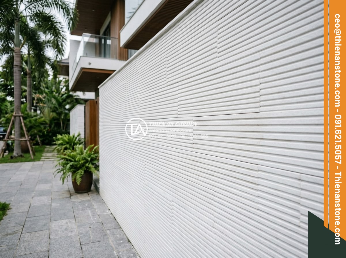 So sánh đá răng lược và gạch răng lược: Đâu là lựa chọn tối ưu? - Real project photo of completed comb tooth stone wall renovation at luxury villa