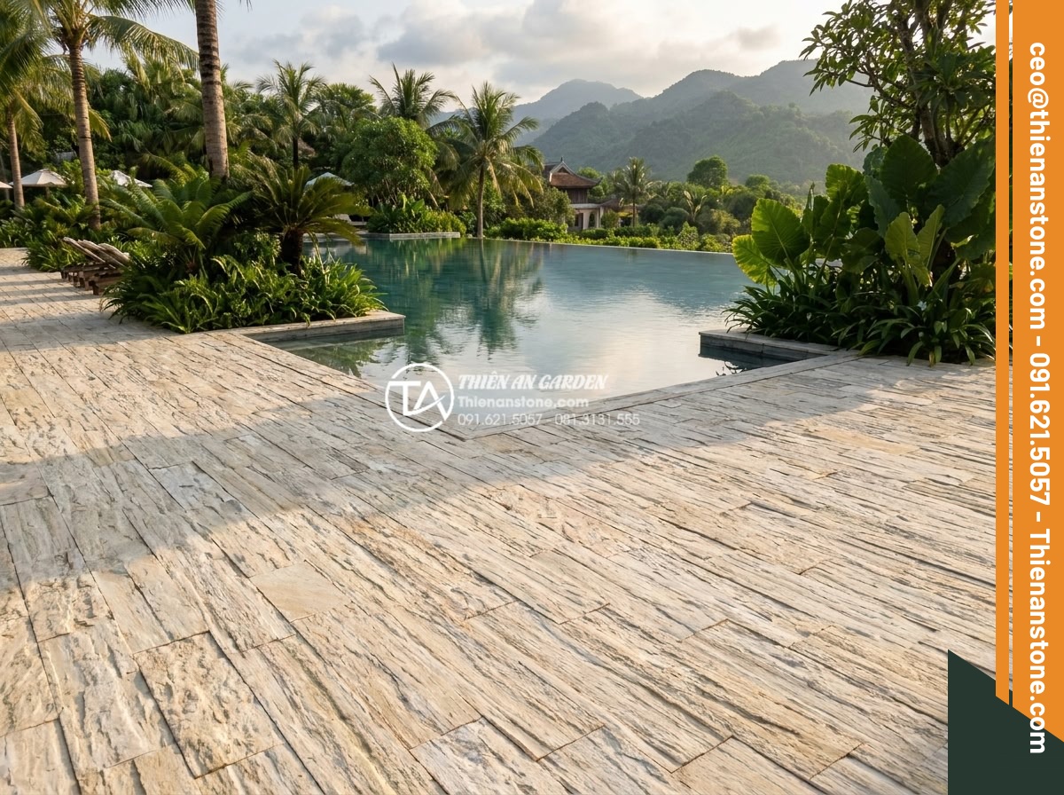 Tại sao nên dùng đá ghép vân gỗ thay cho gỗ tự nhiên khi ốp lát ngoài trời? - Luxurious outdoor resort patio with wood grain stone mosaic flooring surrounding