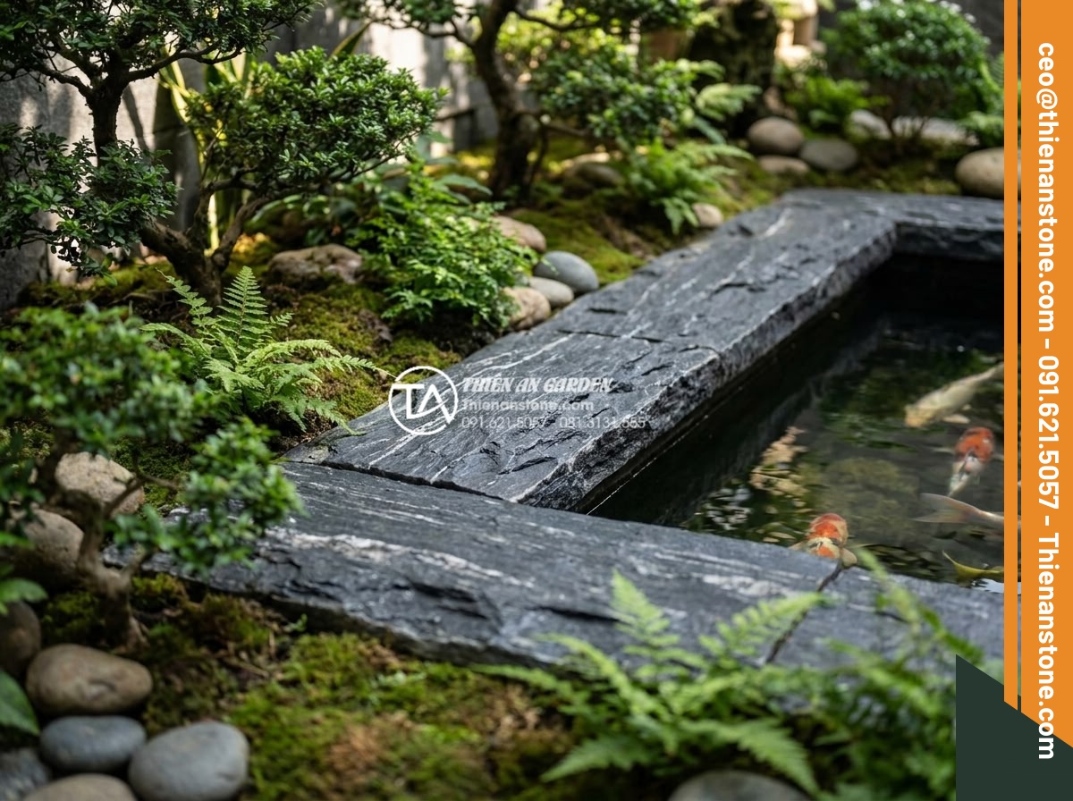 Tại sao nên dùng đá ghép vân gỗ thay cho gỗ tự nhiên khi ốp lát ngoài trời? - Detailed view of Koi pond border lined with durable wood grain stone tiles integ