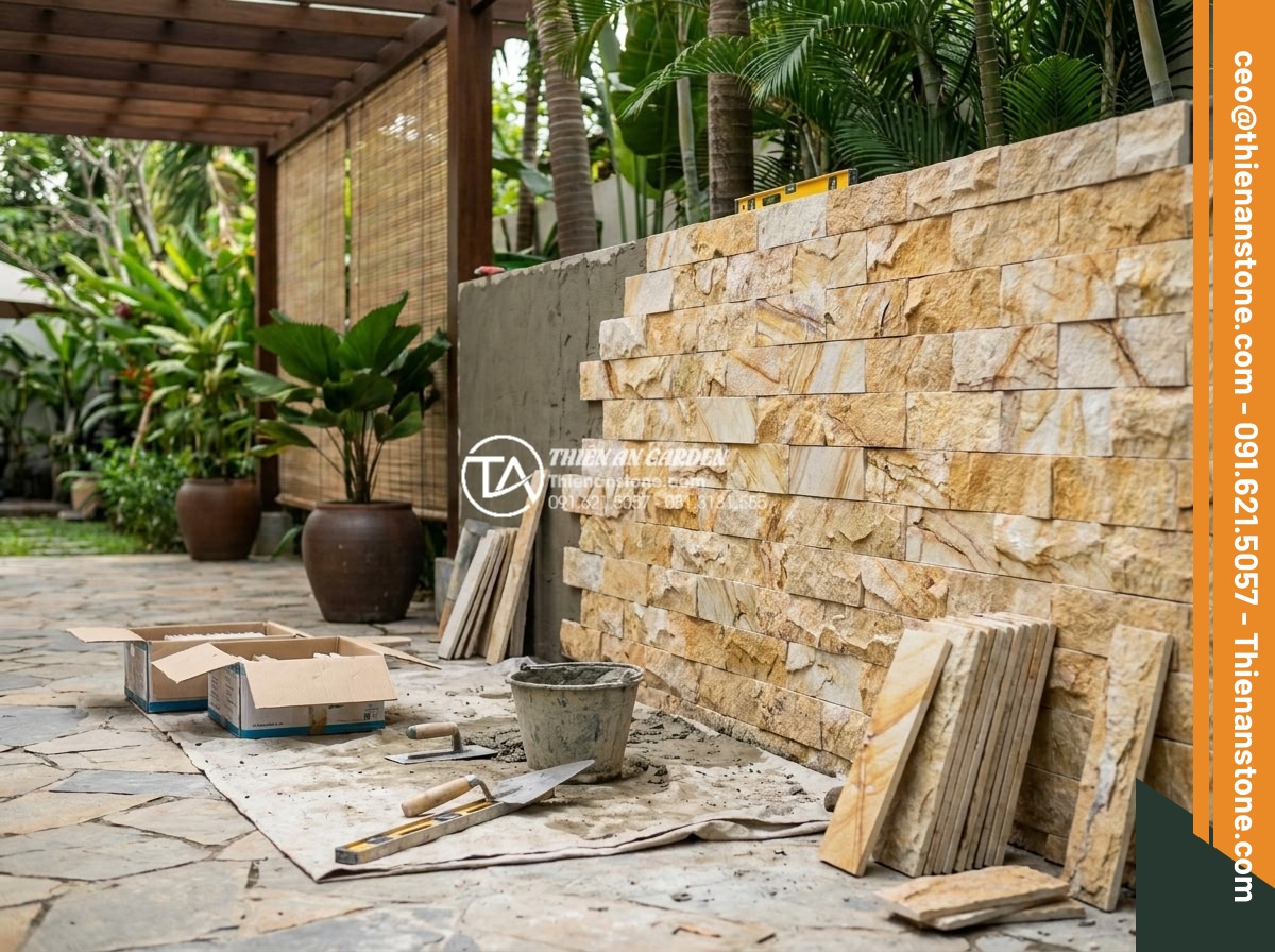 Tại sao nên dùng đá ghép vân gỗ thay cho gỗ tự nhiên khi ốp lát ngoài trời? - Professional team from Da Canh Thien An installing high-end wood grain stone mos