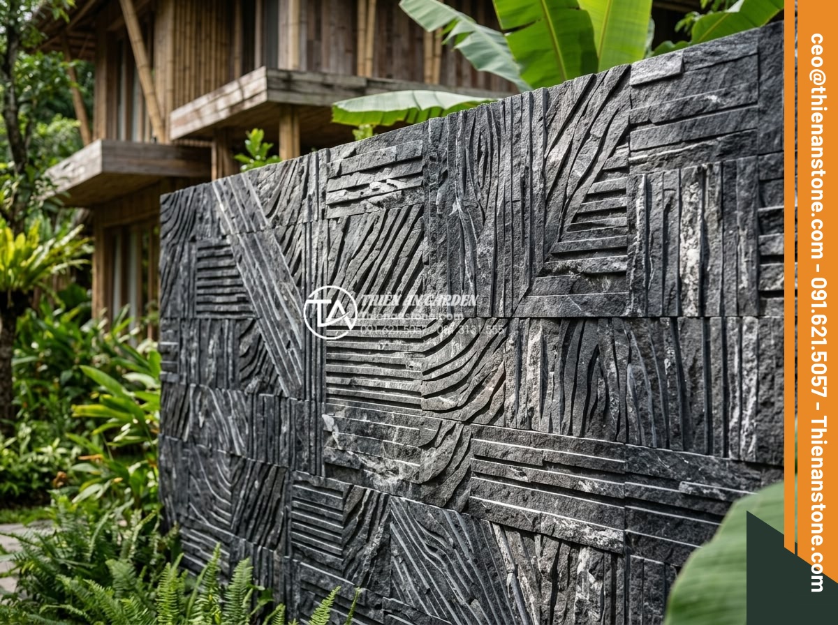 Tổng hợp các kiểu ghép đá trang trí tường độc đáo phá vỡ sự đơn điệu - Hình 12 Tổng hợp các kiểu ghép đá trang trí tường độc đáo phá vỡ sự đơn điệu - Sustainable recycled stone mosaic wall featuring modern black and wood grain pat