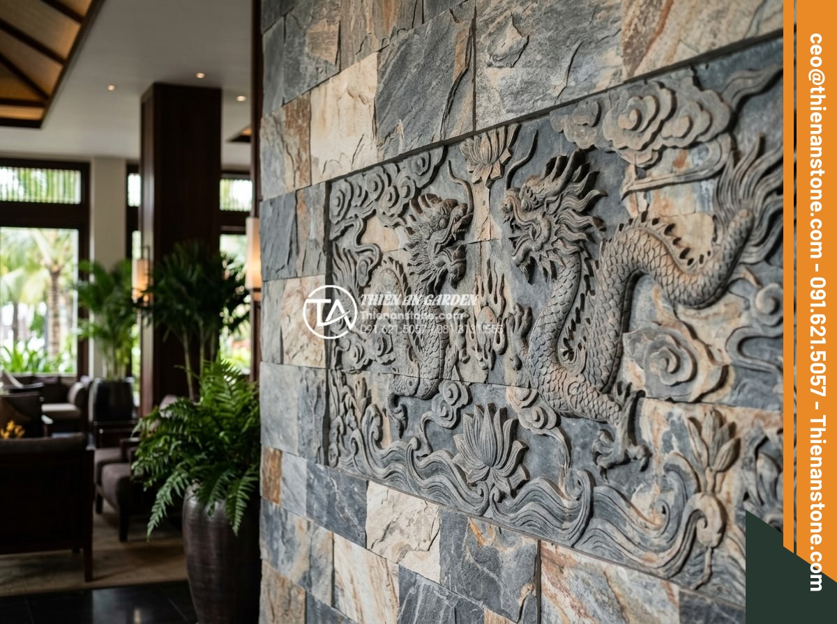 Tổng hợp các kiểu ghép đá trang trí tường độc đáo phá vỡ sự đơn điệu - Hình 8 Tổng hợp các kiểu ghép đá trang trí tường độc đáo phá vỡ sự đơn điệu - Ornate Asian-inspired carved stone decorative wall featuring dragon motifs and t
