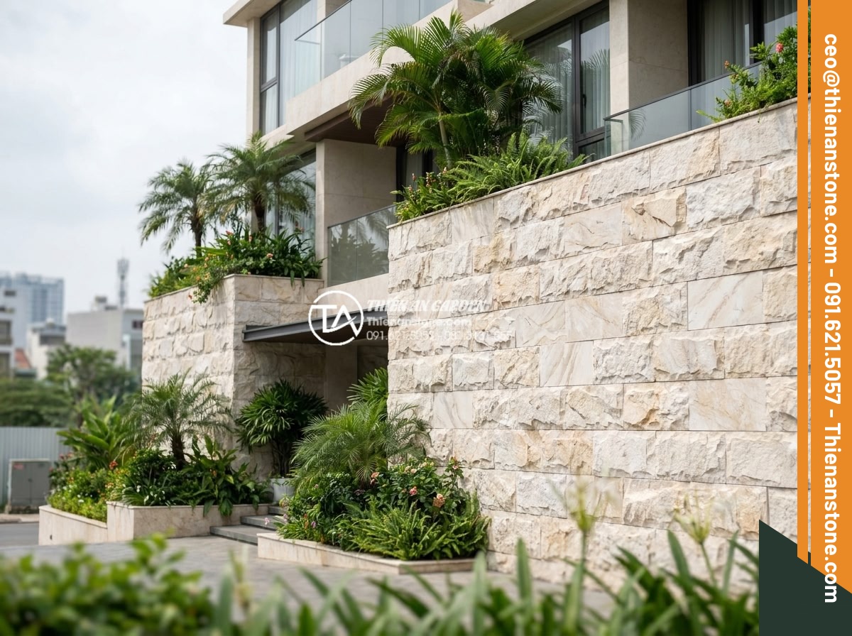 Top 10 mẫu đá ghép vàng và đá ghép 4 màu trang trí mặt tiền sang trọng - Hình 2 Top 10 mẫu đá ghép vàng và đá ghép 4 màu trang trí mặt tiền sang trọng - High-end residential building front elevation featuring vibrant 4-color mosaic s