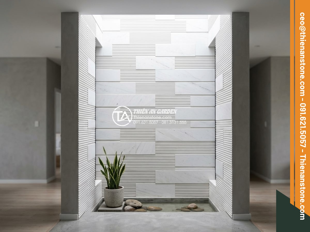 Top 10 mẫu đá răng lược đen ốp giếng trời tạo chiều sâu cực đỉnh - Hình 11 Top 10 mẫu đá răng lược đen ốp giếng trời tạo chiều sâu cực đỉnh - Minimalist black comb tooth stone skywell in modern minimalist home with clean l