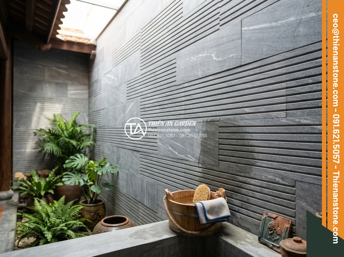 Top 10 mẫu đá răng lược đen ốp giếng trời tạo chiều sâu cực đỉnh - Hình 17 Top 10 mẫu đá răng lược đen ốp giếng trời tạo chiều sâu cực đỉnh - Maintenance process for black comb tooth stone skywell showing cleaning tools an