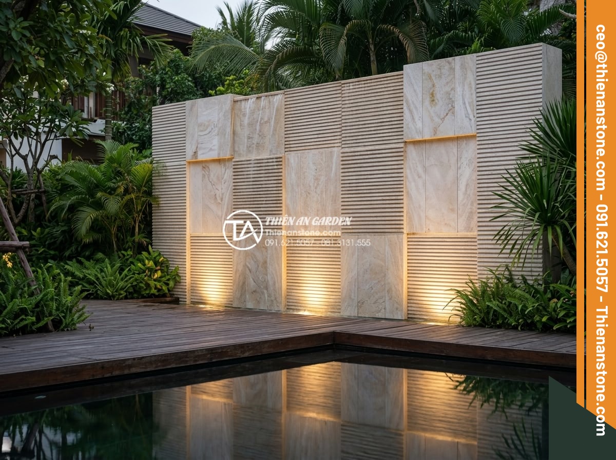 Top 5 địa chỉ mua đá răng lược uy tín, giá tận gốc tại Việt Nam - Elegant modern Vietnamese resort garden at dusk with da rang luoc stone waterfal