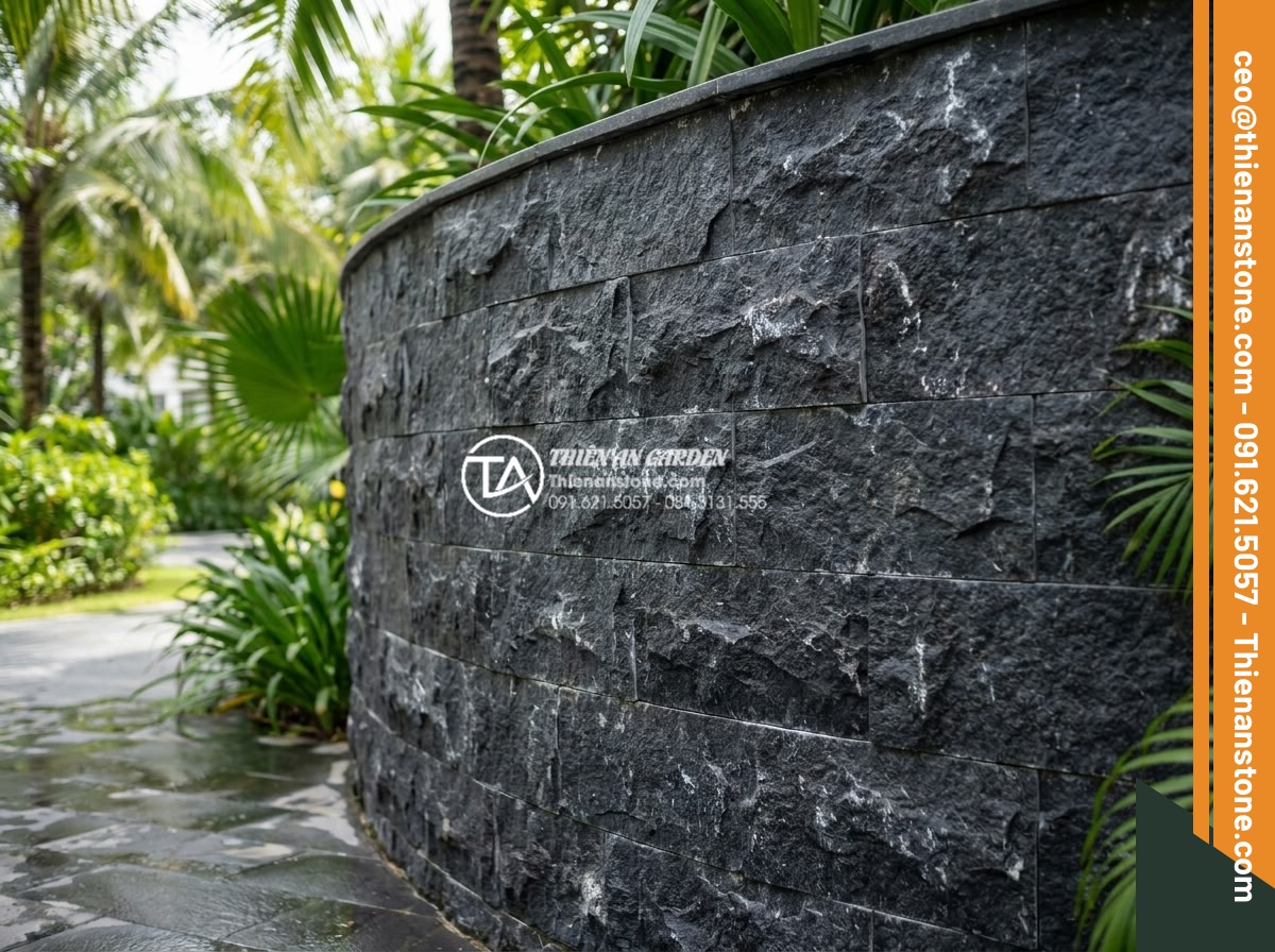 Tư vấn chọn màu đá ghép theo phong thủy rước tài lộc năm 2026 - Finished high-end stone mosaic work in luxury resort landscape using expert tech