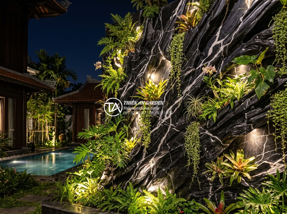 Có nên làm tiểu cảnh vách tường giả (cây giả, đá nhựa) thay vì đồ thật? - Stunning nighttime vertical garden with natural stone, living plants and warm LE