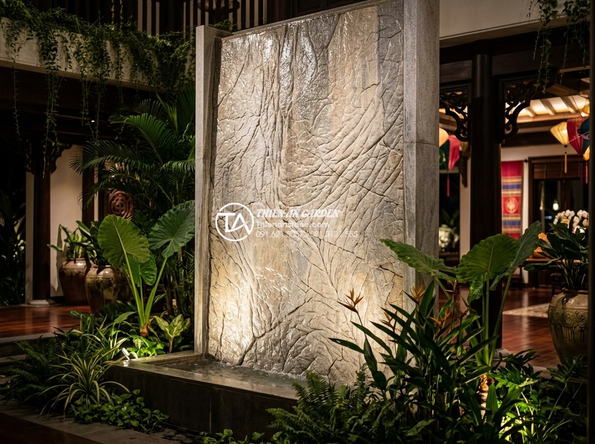 Sự khác biệt giữa tiểu cảnh vách tường khô và tiểu cảnh vách tường ướt - Stunning wet vertical wall feature in upscale resort lobby with crystal clear wa