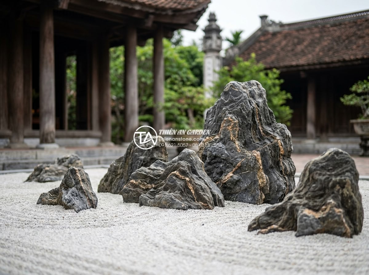 Tại sao tiểu cảnh khô Nhật Bản lại sử dụng đá làm chủ đạo? - Detailed Japanese dry garden rocks with varied textures, colors from gray to bro