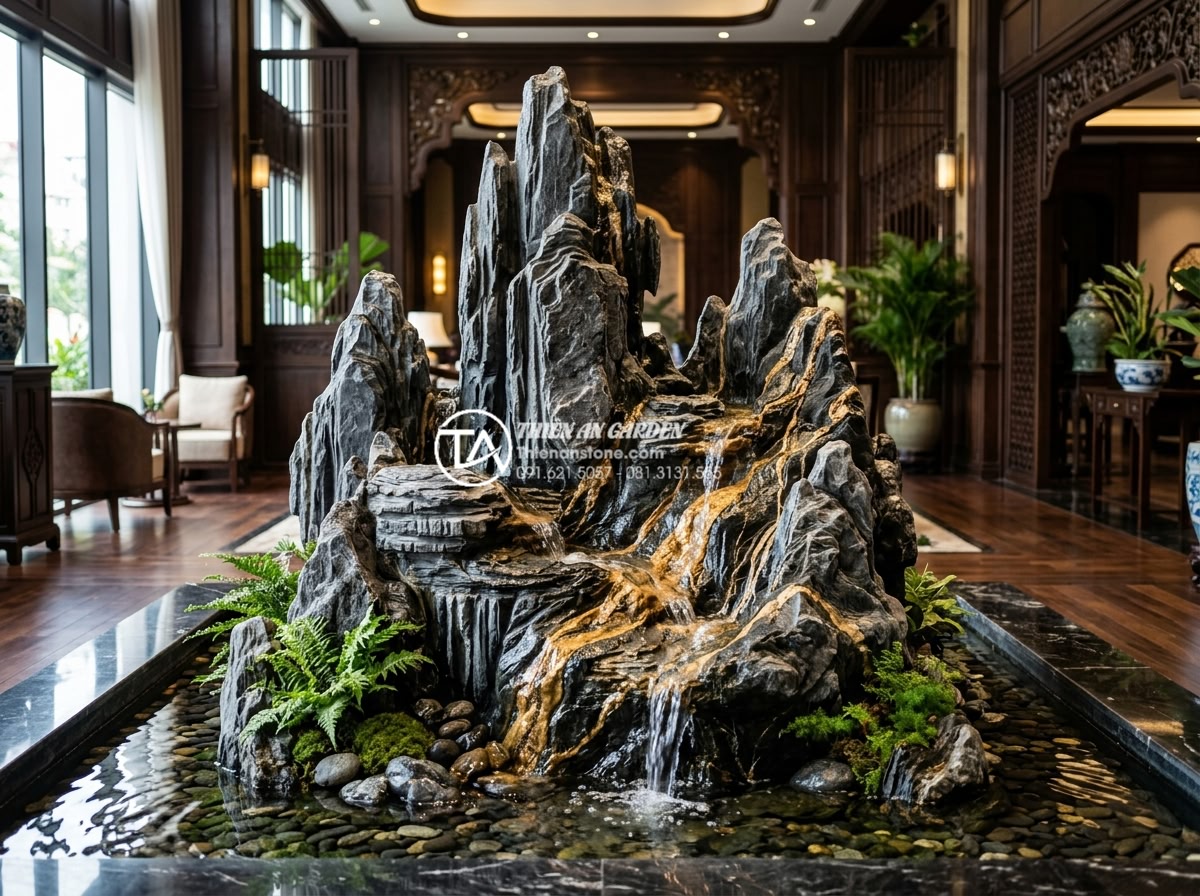 Tại sao tiểu cảnh nước chảy phong thủy lại được giới kinh doanh ưa chuộng? - Hình 6 Tại sao tiểu cảnh nước chảy phong thủy lại được giới kinh doanh ưa chuộng? - High-end commercial space featuring custom carved stone fountain with crystal wa