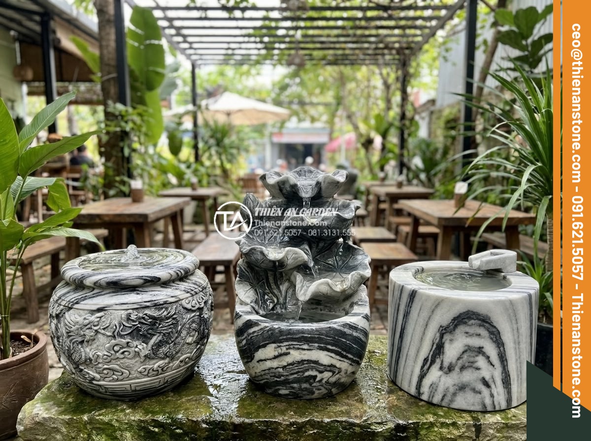 Tiểu cảnh chum nước cho quán cafe: Tuyệt chiêu thu hút khách check-in - Popular stone water jar samples for cafes showing round classic, waterfall tiere