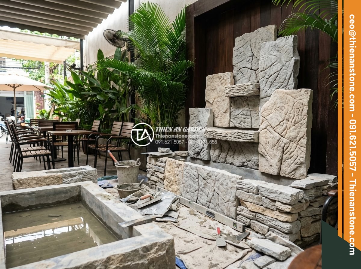 Tiểu cảnh chum nước cho quán cafe: Tuyệt chiêu thu hút khách check-in - Professional team from stone company installing high-quality natural stone water