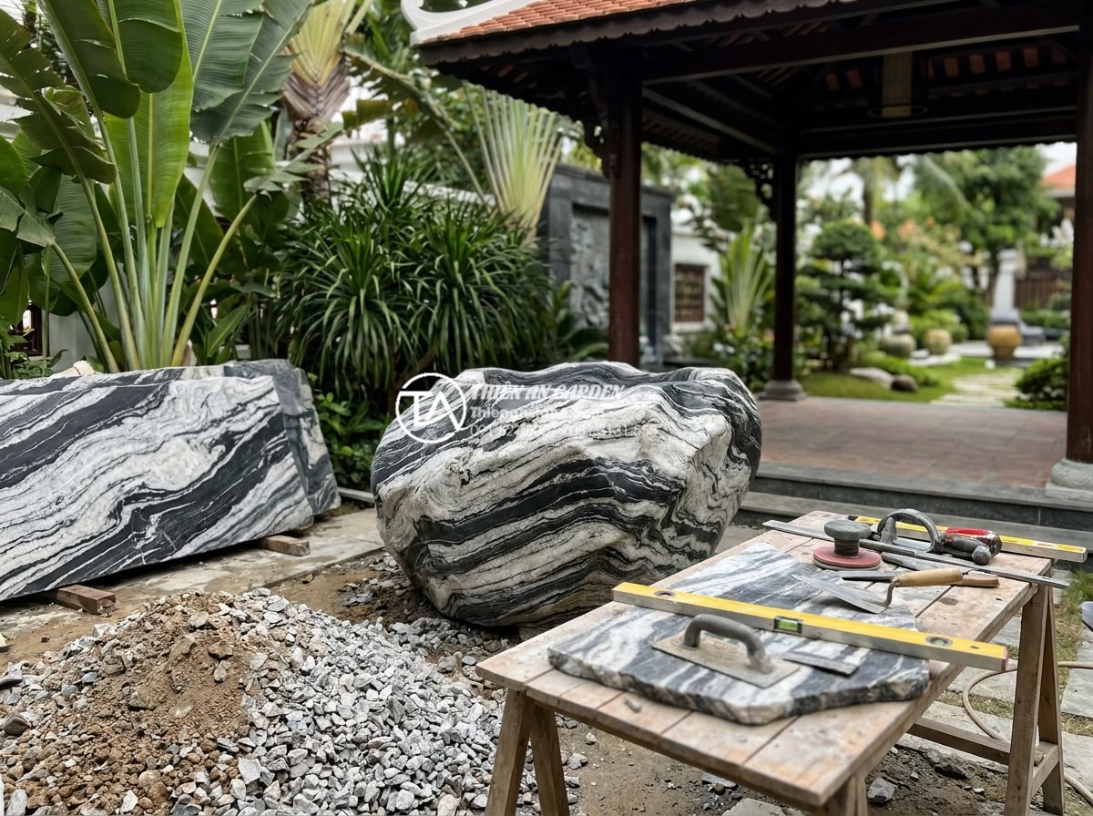 Ý nghĩa phong thủy của tiểu cảnh chum nước: Cách đặt lu nước thu hút tài lộc - Team of professional Vietnamese stone craftsmen and feng shui experts from Da Ca