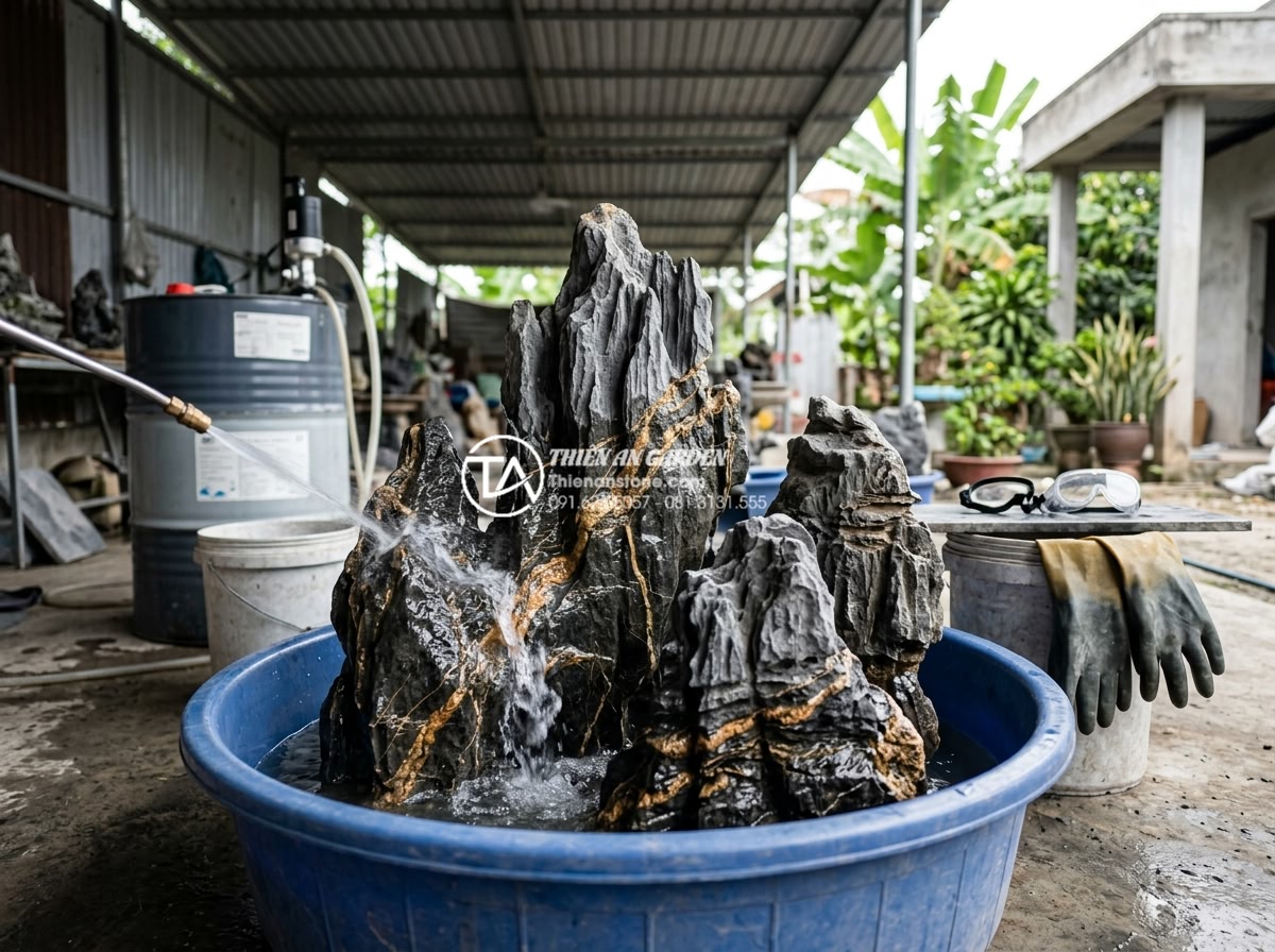 Lỗi thường gặp khi dùng đá trầm tích làm hồ cá và cách khắc phục - Professional technician treating sedimentary rocks with acid wash in a controlle