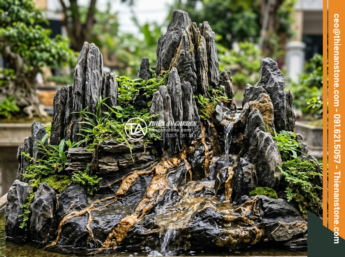 Nghệ thuật sử dụng đá trầm tích trong thiết kế hòn non bộ và tiểu cảnh - Sedimentary rocks arranged in a miniature landscape tiểu cảnh with cascading wat